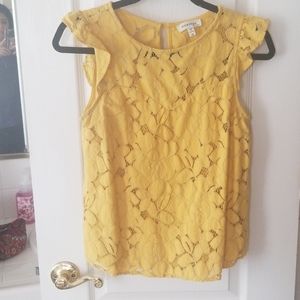 Yellow blouse with lace overlay